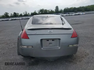 2005 Nissan 350Z Touring z VIN JN1AZ34E05M654954, wystawiony jako Copart lot #57591085 z przebiegiem Nie podano mil oraz Tytuł czysty. Historia ofert i sprzedaży dostępna na DreamBid. Obrazek 6.