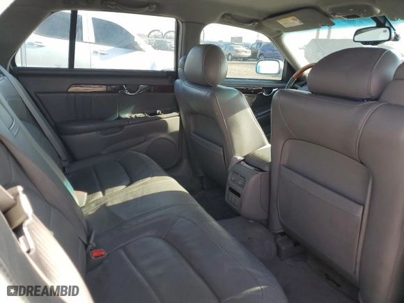 2004 Cadillac DeVille DHS with VIN 1G6KE54Y74U238243, listed as a Copart auction lot 85054564 with 142,652 mi miles and Salvage Title. Bid and sale history available at carsss.com. Image 11.