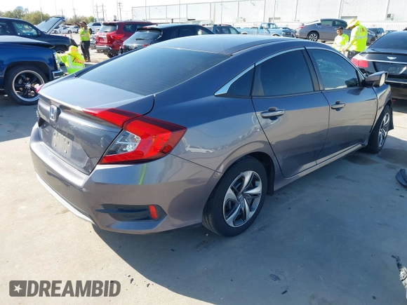 2020 Honda Civic LX z VIN 19XFC2F68LE023059, wystawiony jako IAAI lot #41856327 z przebiegiem 84 499 mil mil oraz . Historia ofert i sprzedaży dostępna na DreamBid. Obrazek 4.