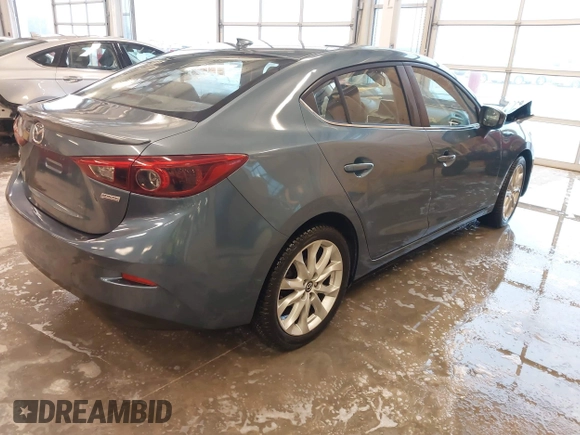 2014 Mazda 3 S Grand Touring with VIN JM1BM1W31E1182703, listed as a IAAI auction lot 41470742 with 123,956 mi miles and . Bid and sale history available at DreamBid. Image 4.