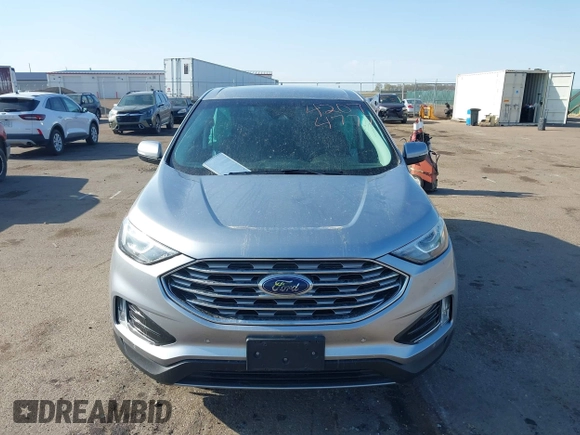 2022 Ford Edge Titanium z VIN 2FMPK4K95NBA33637, wystawiony jako IAAI lot #42074777 z przebiegiem 58 733 mil mil oraz . Historia ofert i sprzedaży dostępna na DreamBid. Obrazek 12.
