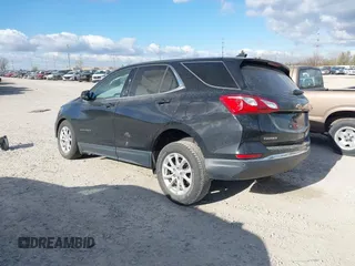 2020 Chevrolet Equinox LT with VIN 2GNAXKEV6L6197615, listed as a IAAI auction lot 42033417 with 100,449 mi miles and . Bid and sale history available at carsss.com. Image 3.