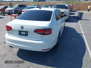 2017 Volkswagen Jetta SE with VIN 3VWDB7AJ4HM209596, listed as a IAAI auction lot 42608209 with 30,559 mi miles and . Bid and sale history available at DreamBid. Image 4.