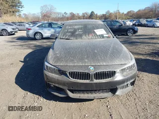2019 BMW 4 Series 440i xDrive with VIN WBA4J7C52KBM75345, listed as a IAAI auction lot 40613703 with 31,402 mi miles and . Bid and sale history available at carsss.com. Image 12.
