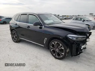 2021 BMW X5 sDrive40i with VIN 5UXCR4C0XM9G05040, listed as a Copart auction lot 50714743 with Not Provided miles. Bid and sale history available at carsss.com. Image 4.
