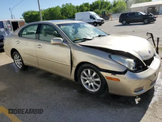 2002 Lexus ES 300 with VIN JTHBF30G020051456, listed as a Copart auction lot 57432435 with 148,207 mi miles and Salvage title. Bid and sale history available at DreamBid. Image 4.