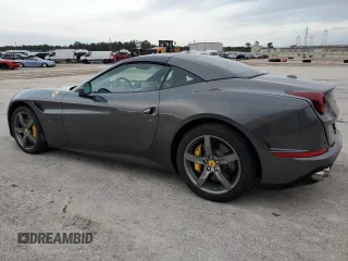2015 Ferrari California T z VIN ZFF77XJA3F0206563, wystawiony jako Copart lot #78976914 z przebiegiem Nie podano mil oraz Szkody całkowita. Historia ofert i sprzedaży dostępna na DreamBid. Obrazek 2.