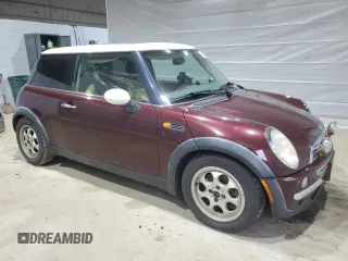 2002 MINI Hardtop with VIN WMWRC33402TC36986, listed as a Copart auction lot 50131045 with 194,224 mi miles and Salvage Title. Bid and sale history available at DreamBid. Image 4.