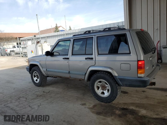 2000 Jeep Cherokee with VIN 1J4FF48S7YL221475, listed as a Copart auction lot 53005275 with 273,246 mi miles and Clean title. Bid and sale history available at DreamBid. Image 2.