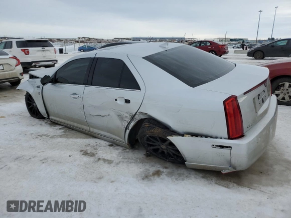 2011 Cadillac STS RWD z VIN 1G6DW6ED4B0120954, wystawiony jako Copart lot #42792695 z przebiegiem Nie podano mil oraz Szkoda całkowita • Salvage title. Historia ofert i sprzedaży dostępna na DreamBid. Obrazek 2.
