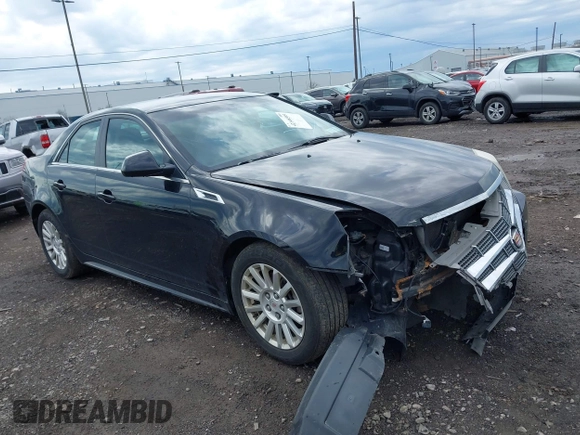 2011 Cadillac CTS z VIN 1G6DC5EY9B0153096, wystawiony jako IAAI lot #42146595 z przebiegiem 148 990 mil mil oraz . Historia ofert i sprzedaży dostępna na DreamBid. Obrazek 1.