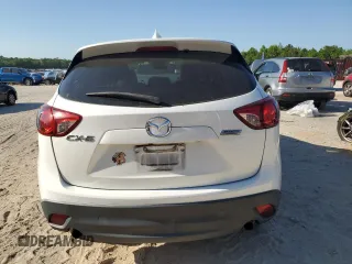 2015 Mazda CX-5 Touring with VIN JM3KE2CY1F0538116, listed as a Copart auction lot 52920205 with 176,476 mi miles and Salvage Title. Bid and sale history available at carsss.com. Image 6.