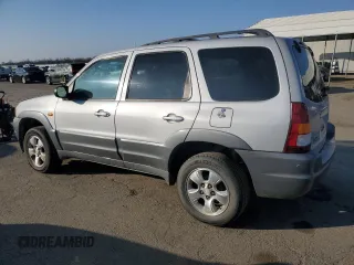 2002 Mazda Tribute LX with VIN 4F2YU09152KM50320, listed as a Copart auction lot 88131405 with 238,013 mi miles and Salvage Title. Bid and sale history available at carsss.com. Image 2.