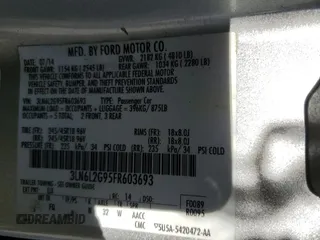2015 Lincoln MKZ z VIN 3LN6L2G95FR603693, wystawiony jako Copart lot #53362845 z przebiegiem 171 107 mil mil oraz Szkoda całkowita • Salvage title. Historia ofert i sprzedaży dostępna na DreamBid. Obrazek 12.