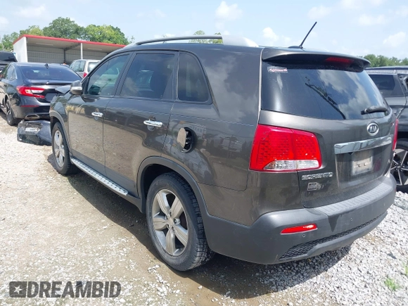 2012 Kia Sorento EX with VIN 5XYKU4A69CG276943, listed as a IAAI auction lot 42604286 with 182,425 mi miles and . Bid and sale history available at DreamBid. Image 3.