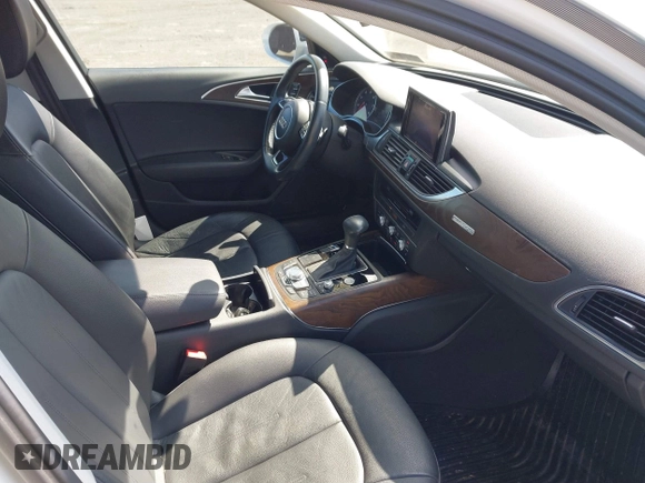 2015 Audi A6 2.0T Premium Plus with VIN WAUGFAFC7FN025958, listed as a IAAI auction lot 41888489 with 100,600 mi miles. Bid and sale history available at carsss.com. Image 5.