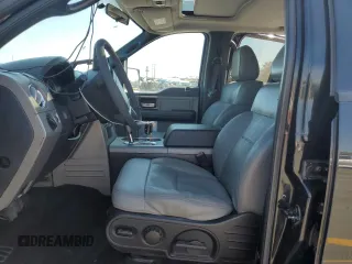 2004 Ford F-150 XLT with VIN 1FTPW14574KC13904, listed as a Copart auction lot 63027105 with 196,739 mi miles and Salvage title. Bid and sale history available at DreamBid. Image 7.