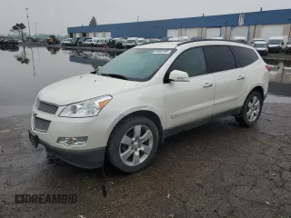 2012 Chevrolet Traverse LTZ z VIN 1GNKVLED6CJ348723, wystawiony jako Copart lot #58563105 z przebiegiem 129 894 mil mil oraz Czysty tytuł • Clean title. Historia ofert i sprzedaży dostępna na DreamBid. Obrazek 1.