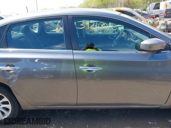 2019 Nissan Sentra S with VIN 3N1AB7AP3KY293231, listed as a IAAI auction lot 39213237 with 102,788 mi miles and . Bid and sale history available at DreamBid. Image 13.