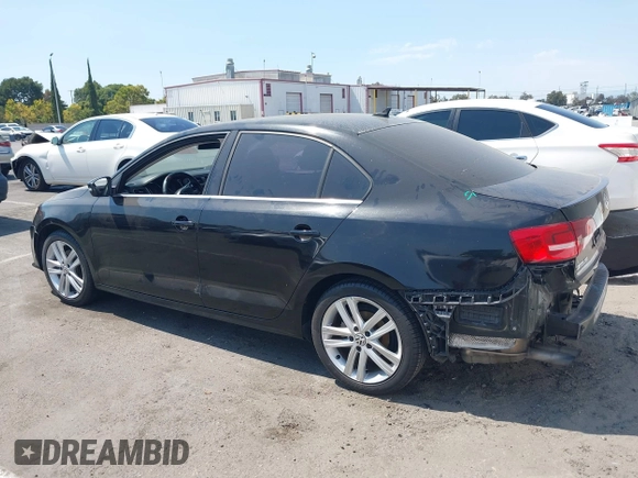 2015 Volkswagen Jetta SEL z VIN 3VWL17AJ7FM307632, wystawiony jako IAAI lot #42766536 z przebiegiem 101 661 mil mil oraz . Historia ofert i sprzedaży dostępna na DreamBid. Obrazek 14.