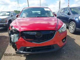 2015 Mazda CX-5 Sport with VIN JM3KE2BE8F0451014, listed as a IAAI auction lot 42536333 with 131,059 mi miles and . Bid and sale history available at DreamBid. Image 12.