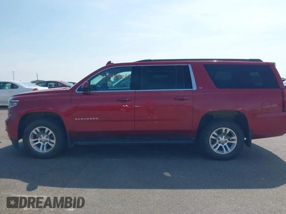 2015 Chevrolet Suburban LT with VIN 1GNSKJKC5FR726299, listed as a IAAI auction lot 42740904 with 96,700 mi miles and . Bid and sale history available at DreamBid. Image 14.