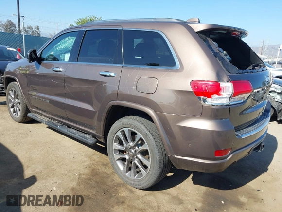 2017 Jeep Grand Cherokee Overland z VIN 1C4RJECG0HC960178, wystawiony jako IAAI lot #42315844 z przebiegiem 63 271 mil mil oraz . Historia ofert i sprzedaży dostępna na DreamBid. Obrazek 3.
