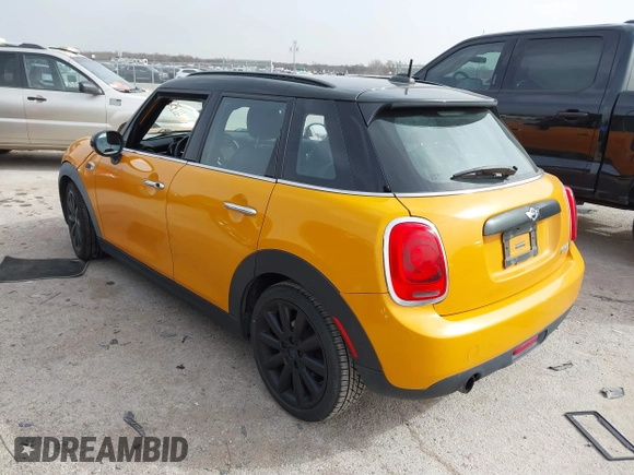 2016 MINI Hardtop 4 Door z VIN WMWXU1C56G2D10006, wystawiony jako IAAI lot #41752731 z przebiegiem 67 844 mil mil oraz . Historia ofert i sprzedaży dostępna na DreamBid. Obrazek 3.