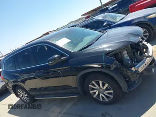 2019 Honda Pilot EX-L with VIN 5FNYF5H56KB042918, listed as a IAAI auction lot 42040516 with 113,433 mi miles and . Bid and sale history available at DreamBid. Image 14.