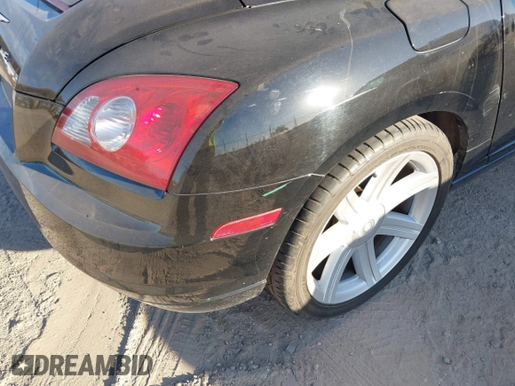 2005 Chrysler Crossfire with VIN 1C3AN55L55X051986, listed as a IAAI auction lot 41288735 with 97,853 mi miles and . Bid and sale history available at DreamBid. Image 6.