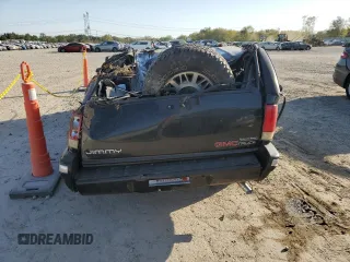 1995 GMC Jimmy SL with VIN 1GKDT13W4S2547931, listed as a Copart auction lot 74549694 with 99,373 mi miles and Salvage Title. Bid and sale history available at carsss.com. Image 6.
