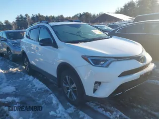 2018 Toyota RAV4 XLE with VIN 2T3RFREVXJW819111, listed as a IAAI auction lot 41580876 with 74,748 mi miles. Bid and sale history available at carsss.com. Image 1.