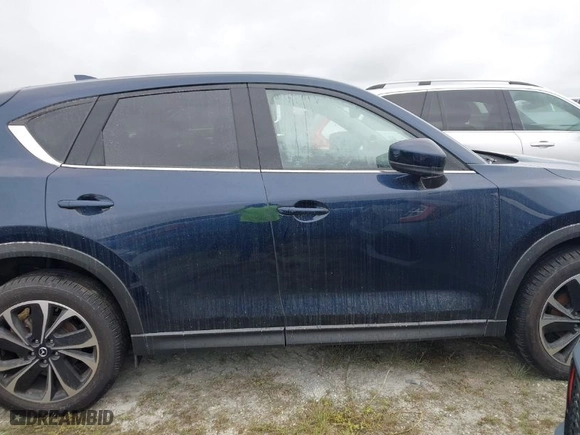 2022 Mazda CX-5 2.5 S Premium Package with VIN JM3KFBDMXN1618807, listed as a IAAI auction lot 40476313 with NaN miles. Bid and sale history available at carsss.com. Image 13.