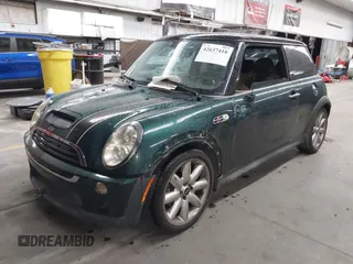 2006 MINI Hardtop S z VIN WMWRE33536TJ40341, wystawiony jako IAAI lot #42637418 z przebiegiem 93 338 mil mil oraz . Historia ofert i sprzedaży dostępna na DreamBid. Obrazek 2.