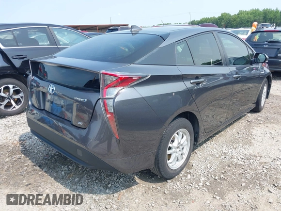 2016 Toyota Prius Four z VIN JTDKARFU1G3027589, wystawiony jako IAAI lot #42391692 z przebiegiem 172 255 mil mil oraz . Historia ofert i sprzedaży dostępna na DreamBid. Obrazek 4.