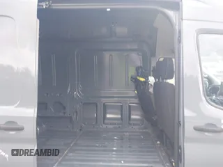 2023 Ford Transit Cargo with VIN 1FTBR3U88PKB86644, listed as a IAAI auction lot 41089106 with 8,095 mi miles and . Bid and sale history available at DreamBid. Image 8.