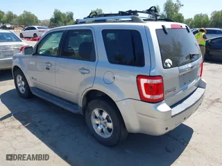 2009 Ford Escape Hybrid with VIN 1FMCU49309KC11542, listed as a IAAI auction lot 42028593 with 168,573 mi miles. Bid and sale history available at carsss.com. Image 3.