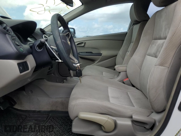 2010 Honda Insight EX with VIN JHMZE2H79AS038112, listed as a Copart auction lot 54794785 with 183,457 mi miles and Salvage Title. Bid and sale history available at DreamBid. Image 7.