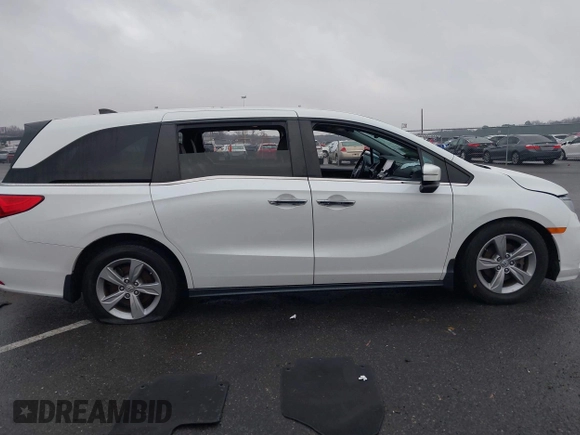 2020 Honda Odyssey EX-L with VIN 5FNRL6H78LB031411, listed as a IAAI auction lot 41027726 with 55,586 mi miles. Bid and sale history available at carsss.com. Image 13.