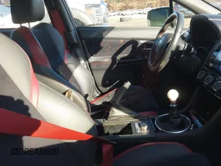 2018 Subaru WRX STI с VIN JF1VA2M61J9813122, выставлен на аукционе IAAI как лот 41576235 с пробегом 49 527 миль миль и . История ставок и продаж доступна на DreamBid. Изображение 5.