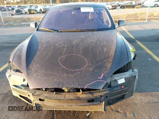 2013 Tesla Model S with VIN 5YJSA1CN7DFP22690, listed as a IAAI auction lot 40981089 with 188,057 mi miles. Bid and sale history available at carsss.com. Image 10.