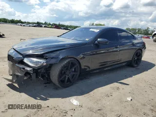 2015 BMW M6 z VIN WBS6C9C50FD467779, wystawiony jako Copart lot #56702794 z przebiegiem 78 259 mil mil oraz Szkody całkowita. Historia ofert i sprzedaży dostępna na DreamBid. Obrazek 1.