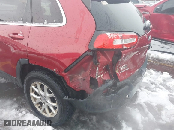 2014 Jeep Cherokee Latitude with VIN 1C4PJMCB8EW166853, listed as a IAAI auction lot 41579386 with 251,683 mi miles and . Bid and sale history available at DreamBid. Image 6.