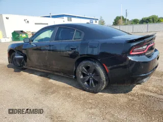 2019 Dodge Charger SXT with VIN 2C3CDXBG2KH509966, listed as a Copart auction lot 61742105 with 96,632 mi miles and Salvage title. Bid and sale history available at DreamBid. Image 2.