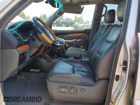 2004 Lexus GX 470 with VIN JTJBT20X640052213, listed as a Copart auction lot 52708415 with 390,451 mi miles and Salvage Title. Bid and sale history available at carsss.com. Image 7.