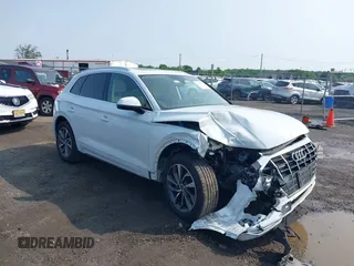 2021 Audi Q5 Premium Plus z VIN WA1BAAFYXM2050028, wystawiony jako IAAI lot #42479898 z przebiegiem 39 015 mil mil oraz . Historia ofert i sprzedaży dostępna na DreamBid. Obrazek 6.