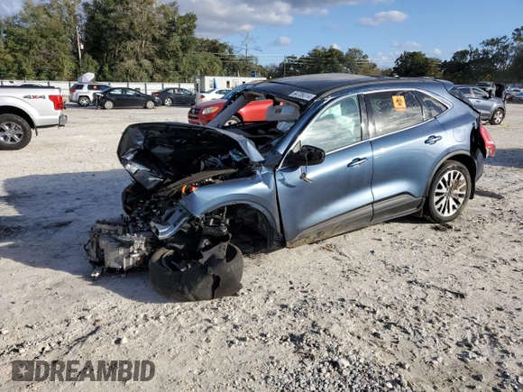 2020 Ford Escape Titanium Hybrid z VIN 1FMCU9DZ4LUC29367, wystawiony jako Copart lot #84709314 z przebiegiem Nie podano mil oraz Nie do naprawy • Non repairable. Historia ofert i sprzedaży dostępna na DreamBid. Obrazek 1.