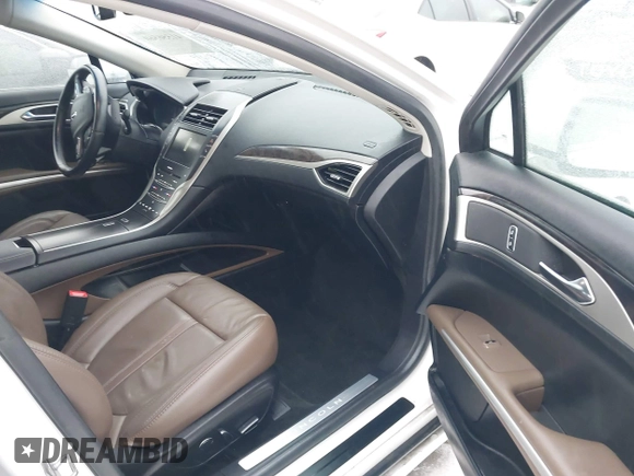 2016 Lincoln MKZ with VIN 3LN6L2G9XGR611001, listed as a IAAI auction lot 41556560 with 95,490 mi miles and . Bid and sale history available at DreamBid. Image 5.