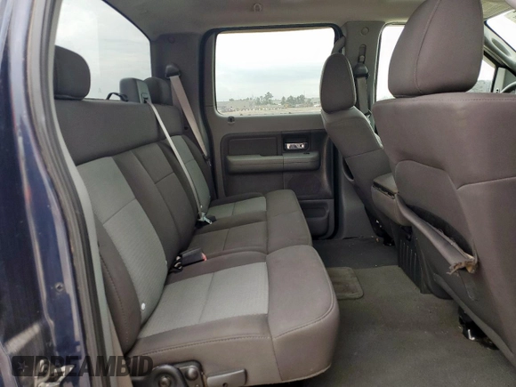 2005 Ford F-150 XLT with VIN 1FTPW12585KF09387, listed as a Copart auction lot 59563175 with 194,153 mi miles and Salvage title. Bid and sale history available at DreamBid. Image 10.