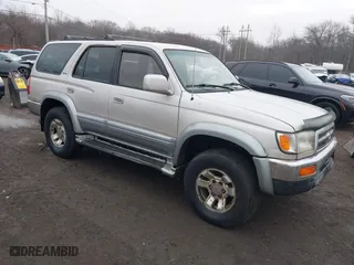 1997 Toyota 4Runner Limited with VIN JT3HN87R6V0092847, listed as a IAAI auction lot 41469151 with 243,105 mi miles. Bid and sale history available at carsss.com. Image 1.